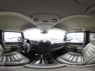 2005 Hummer H2 SUV with VIN 5GRGN23U95H129470, listed as a IAAI auction lot 42046654 with 63,489 mi miles. Bid and sale history available at carsss.com. Image 18.