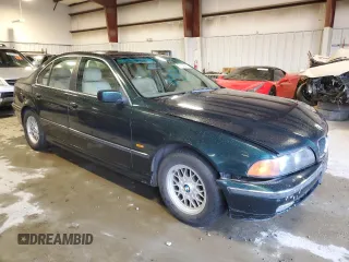 1997 BMW 5 Series 528iA with VIN WBADD6325VBW23550, listed as a Copart auction lot 87943625 with 216,901 mi miles and Salvage Title. Bid and sale history available at carsss.com. Image 4.