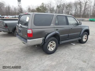 1998 Toyota 4Runner Limited with VIN JT3HN87R2W0150437, listed as a IAAI auction lot 41714141 with 264,389 mi miles. Bid and sale history available at carsss.com. Image 4.
