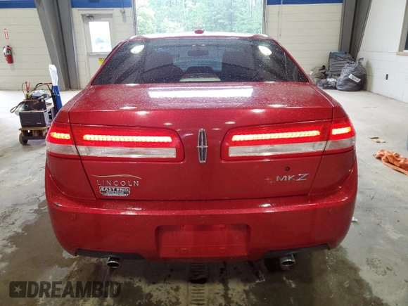 2012 Lincoln MKZ z VIN 3LNHL2GC1CR839595, wystawiony jako Copart lot #57206445 z przebiegiem 155 915 mil mil oraz Szkoda całkowita • Salvage title. Historia ofert i sprzedaży dostępna na DreamBid. Obrazek 6.