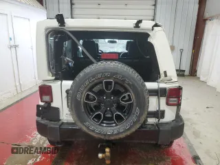 2017 Jeep Wrangler Unlimited 75th Anniversary with VIN 1C4BJWEG4HL675312, listed as a Copart auction lot 43602725 with 99,952 mi miles and Salvage title. Bid and sale history available at DreamBid. Image 6.