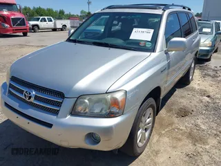 2006 Toyota Highlander Hybrid with VIN JTEDW21A060015086, listed as a IAAI auction lot 42138780 with 228,472 mi miles. Bid and sale history available at carsss.com. Image 13.