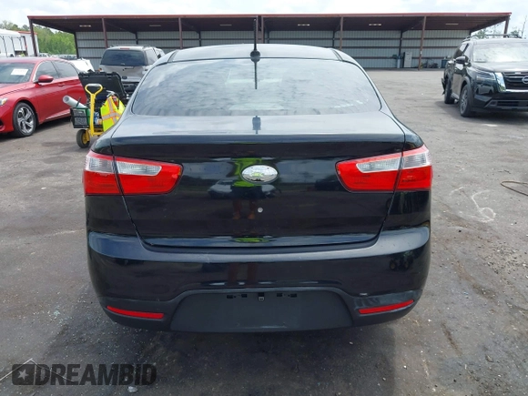 2014 Kia Rio LX with VIN KNADM4A33E6335499, listed as a IAAI auction lot 42123085 with 148,146 mi miles and . Bid and sale history available at DreamBid. Image 16.