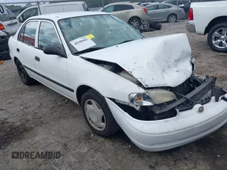 1999 Chevrolet Prizm z VIN 1Y1SK5283XZ432831, wystawiony jako IAAI lot #40388402 z przebiegiem 200 144 mil mil oraz . Historia ofert i sprzedaży dostępna na DreamBid. Obrazek 1.