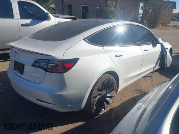 2021 Tesla Model 3 Performance with VIN 5YJ3E1EC6MF926448, listed as a IAAI auction lot 41240309 with 39,386 mi miles and . Bid and sale history available at DreamBid. Image 4.