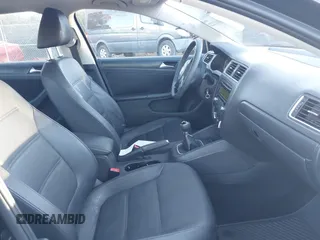 2012 Volkswagen Jetta SE with VIN 3VWBP7AJ3CM338852, listed as a IAAI auction lot 41011223 with 307,098 mi miles and . Bid and sale history available at DreamBid. Image 5.