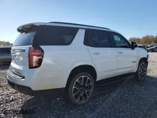 2023 Chevrolet Tahoe RST with VIN 1GNSKRKD3PR210239, listed as a Copart auction lot 82106974 with 57,854 mi miles and Salvage Title. Bid and sale history available at carsss.com. Image 3.