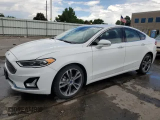 2020 Ford Fusion Titanium with VIN 3FA6P0D96LR175863, listed as a Copart auction lot 60570305 with 76,064 mi miles and Salvage title. Bid and sale history available at DreamBid. Image 1.