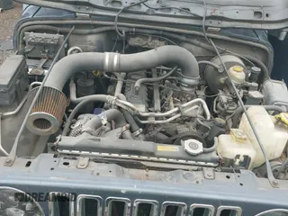 2002 Jeep Wrangler Sport z VIN 1J4FA49S02P708112, wystawiony jako IAAI lot #43374001 z przebiegiem 252 386 mil mil oraz . Historia ofert i sprzedaży dostępna na DreamBid. Obrazek 19.