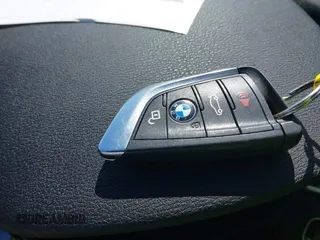 2019 BMW X1 xDrive28i with VIN WBXHT3C58K5N05523, listed as a IAAI auction lot 41752675 with 63,861 mi miles. Bid and sale history available at carsss.com. Image 11.