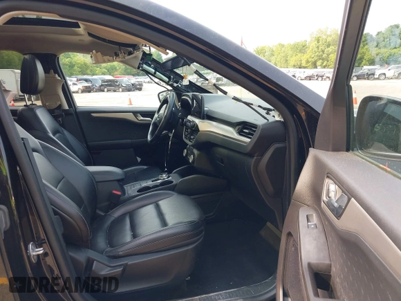 2020 Ford Escape SE Sport Hybrid with VIN 1FMCU9BZ4LUC25970, listed as a IAAI auction lot 42404984 with 102,651 mi miles and . Bid and sale history available at DreamBid. Image 5.
