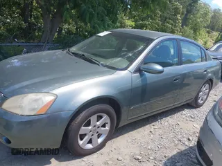 2002 Nissan Altima S z VIN 1N4AL11D02C147963, wystawiony jako IAAI lot #42318252 z przebiegiem 203 894 mil mil oraz . Historia ofert i sprzedaży dostępna na DreamBid. Obrazek 14.