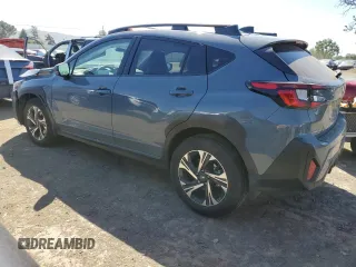 2024 Subaru Crosstrek Premium z VIN JF2GUADC9R8305042, wystawiony jako Copart lot #55796805 z przebiegiem 9 518 mil mil oraz Szkoda całkowita • Salvage title. Historia ofert i sprzedaży dostępna na DreamBid. Obrazek 2.