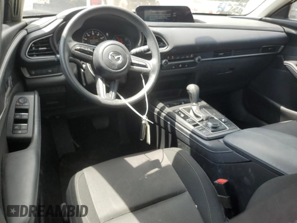 2023 Mazda CX-30 S with VIN 3MVDMBAM6PM513651, listed as a Copart auction lot 57432955 with 49,851 mi miles and Salvage title. Bid and sale history available at DreamBid. Image 8.