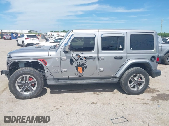 2018 Jeep Wrangler Unlimited Sahara with VIN 1C4HJXEG4JW115522, listed as a IAAI auction lot 42322791 with 68,409 mi miles and . Bid and sale history available at DreamBid. Image 14.