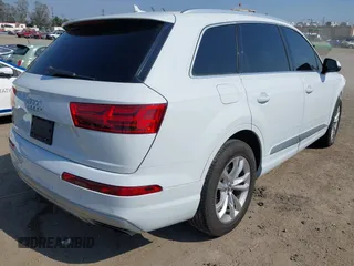 2019 Audi Q7 Premium with VIN WA1AAAF74KD004991, listed as a IAAI auction lot 42180183 with 53,188 mi miles and . Bid and sale history available at DreamBid. Image 4.