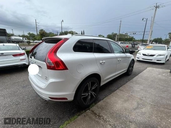 2017 Volvo XC60 R-Design with VIN YV449MRS8H2035952, listed as a Copart auction lot 56962295 with 81,347 mi miles and Clean title. Bid and sale history available at DreamBid. Image 4.
