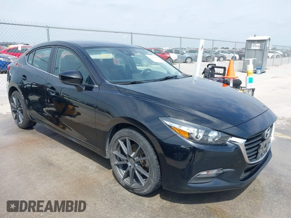 2018 Mazda 3 Touring with VIN 3MZBN1V32JM208914, listed as a IAAI auction lot 42066757 with 111,249 mi miles and . Bid and sale history available at DreamBid. Image 1.
