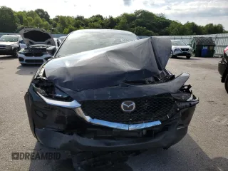2020 Mazda CX-30 with VIN 3MVDMBBL9LM104107, listed as a Copart auction lot 62007684 with 52,753 mi miles and Salvage Title. Bid and sale history available at DreamBid. Image 5.