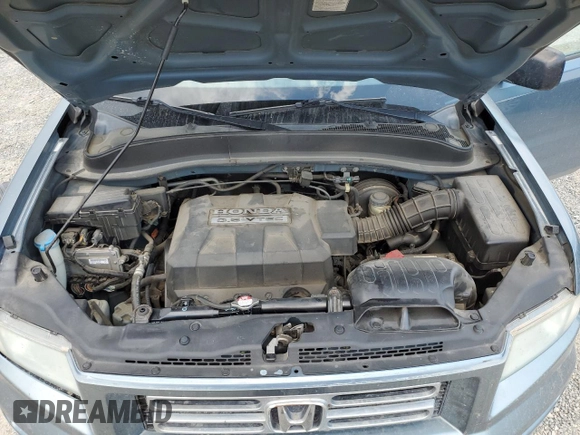 2007 Honda Ridgeline RTX z VIN 2HJYK16357H500239, wystawiony jako Copart lot #70227164 z przebiegiem 186 443 mil mil oraz Czysty tytuł • Clean title. Historia ofert i sprzedaży dostępna na DreamBid. Obrazek 11.