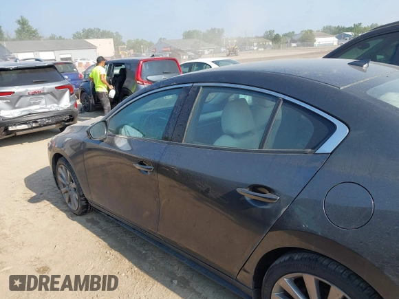 2019 Mazda 3 Premium with VIN JM1BPBEM6K1133340, listed as a IAAI auction lot 42711496 with 121,674 mi miles and . Bid and sale history available at DreamBid. Image 14.