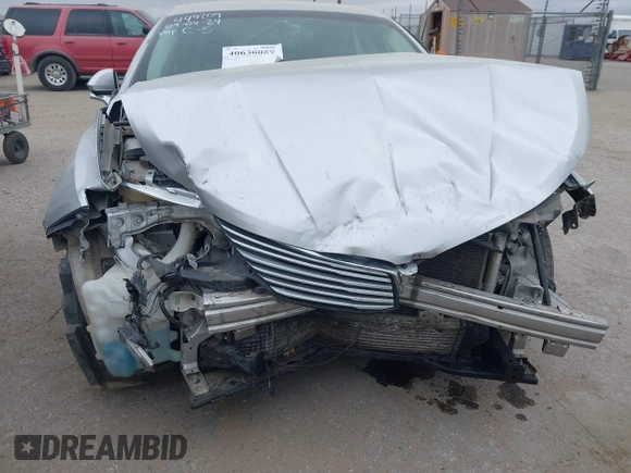 2013 Lincoln MKZ z VIN 3LN6L2G90DR826978, wystawiony jako IAAI lot #40630089 z przebiegiem Nie podano mil oraz . Historia ofert i sprzedaży dostępna na DreamBid. Obrazek 6.