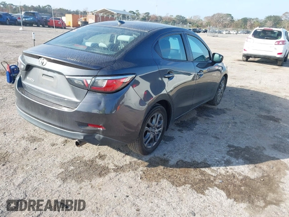 2019 Toyota Yaris Sedan L with VIN 3MYDLBYVXKY506966, listed as a IAAI auction lot 41455800 with 106,284 mi miles. Bid and sale history available at carsss.com. Image 4.