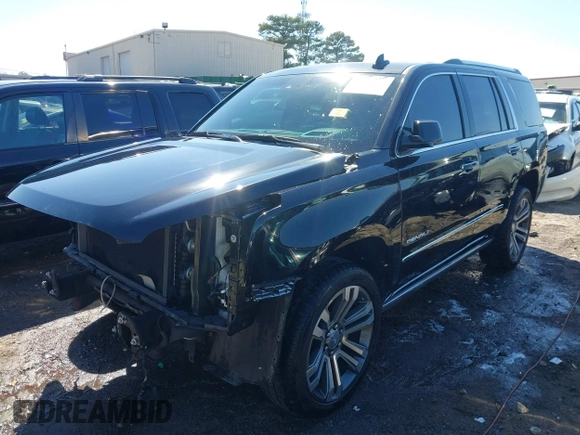 2018 GMC Yukon Denali with VIN 1GKS2CKJ2JR303356, listed as a IAAI auction lot 41768935 with 89,869 mi miles. Bid and sale history available at carsss.com. Image 2.