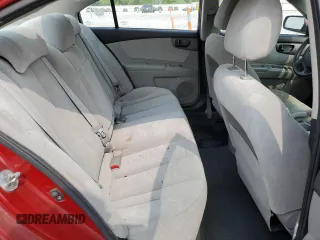 2009 Kia Optima LX z VIN KNAGE228795334599, wystawiony jako Copart lot #59276515 z przebiegiem 180 399 mil mil oraz Szkoda całkowita • Salvage title. Historia ofert i sprzedaży dostępna na DreamBid. Obrazek 10.