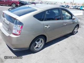 2005 Toyota Prius with VIN JTDKB20U950123255, listed as a IAAI auction lot 42256870 with 226,904 mi miles and . Bid and sale history available at DreamBid. Image 4.