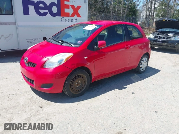 2009 Toyota Yaris with VIN JTDJT903X95251943, listed as a IAAI auction lot 42124300 with 193,503 mi miles. Bid and sale history available at carsss.com. Image 2.