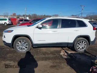 2017 Jeep Cherokee Limited with VIN 1C4PJMDB0HW529665, listed as a IAAI auction lot 41412162 with 89,074 mi miles and . Bid and sale history available at DreamBid. Image 14.
