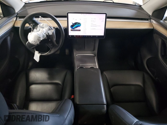 2023 Tesla Model Y Long Range z VIN 7SAYGDEE5PA067389, wystawiony jako Copart lot #54109625 z przebiegiem 24 849 mil mil oraz Szkody całkowita. Historia ofert i sprzedaży dostępna na DreamBid. Obrazek 8.