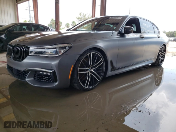 2017 BMW 7 Series 750i with VIN WBA7F0C37HGM22348, listed as a Copart auction lot 65400123 with 0 mi miles. Bid and sale history available at carsss.com. Image 1.