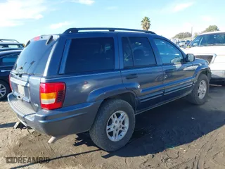 2002 Jeep Grand Cherokee Laredo with VIN 1J4GW48N72C261741, listed as a IAAI auction lot 40972222 with 174,516 mi miles. Bid and sale history available at carsss.com. Image 4.
