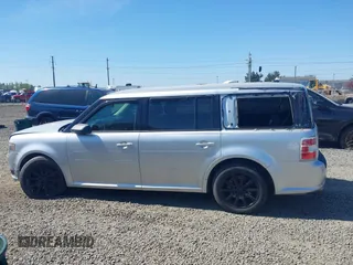 2014 Ford Flex SE z VIN 2FMGK5B85EBD33594, wystawiony jako IAAI lot #42015065 z przebiegiem 171 178 mil mil oraz . Historia ofert i sprzedaży dostępna na DreamBid. Obrazek 14.