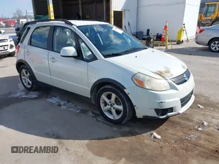 2008 Suzuki SX4 with VIN JS2YB413885101448, listed as a IAAI auction lot 41569235 with 130,633 mi miles. Bid and sale history available at carsss.com. Image 1.