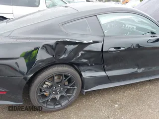 2018 Ford Mustang EcoBoost z VIN 1FA6P8TH3J5129088, wystawiony jako IAAI lot #41792548 z przebiegiem 55 991 mil mil oraz . Historia ofert i sprzedaży dostępna na DreamBid. Obrazek 6.