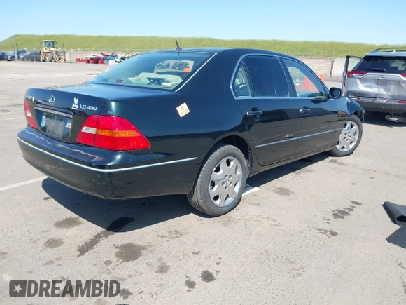 2001 Lexus LS 430 z VIN JTHBN30F810045610, wystawiony jako IAAI lot #42004279 z przebiegiem 143 497 mil mil oraz . Historia ofert i sprzedaży dostępna na DreamBid. Obrazek 4.