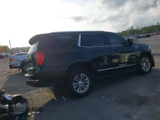 2021 GMC Yukon SLT with VIN 1GKS1BKD8MR264204, listed as a IAAI auction lot 41859983 with 118,968 mi miles. Bid and sale history available at carsss.com. Image 4.