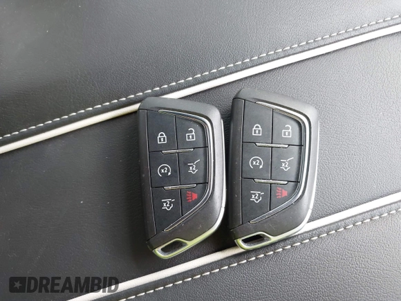 2021 Cadillac Escalade Premium Luxury z VIN 1GYS4BKL6MR453583, wystawiony jako IAAI lot #42129264 z przebiegiem 11 322 mil mil oraz . Historia ofert i sprzedaży dostępna na DreamBid. Obrazek 11.