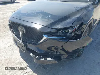 2018 Mazda CX-5 Grand Touring with VIN JM3KFADM8J0330035, listed as a IAAI auction lot 41878680 with 62,632 mi miles. Bid and sale history available at carsss.com. Image 6.