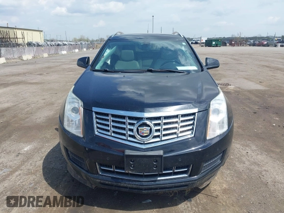 2014 Cadillac SRX Luxury Collection z VIN 3GYFNEE32ES659705, wystawiony jako IAAI lot #42148269 z przebiegiem 140 560 mil mil oraz . Historia ofert i sprzedaży dostępna na DreamBid. Obrazek 12.