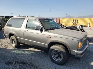 1988 GMC Jimmy z VIN 1GKCS18Z2J8541042, wystawiony jako Copart lot #78100004 z przebiegiem 199 916 mil mil oraz Czysty tytuł • Clean title. Historia ofert i sprzedaży dostępna na DreamBid. Obrazek 4.