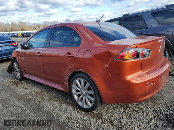 2011 Mitsubishi Lancer GTS with VIN JA32U8FW6BU011215, listed as a Copart auction lot 86357004 with 128,577 mi miles and Salvage Title. Bid and sale history available at carsss.com. Image 2.