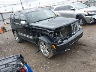 2011 Jeep Liberty Sport with VIN 1J4PN2GK2BW577724, listed as a IAAI auction lot 41032620 with 147,888 mi miles and . Bid and sale history available at carsss.com. Image 1.