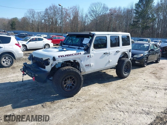 2022 Jeep Wrangler Unlimited Rubicon z VIN 1C4JJXFGXNW121489, wystawiony jako IAAI lot #41749550 z przebiegiem 56 601 mil mil oraz . Historia ofert i sprzedaży dostępna na DreamBid. Obrazek 18.
