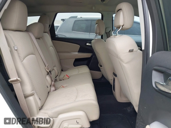 2014 Dodge Journey American Value with VIN 3C4PDCAB8ET141803, listed as a IAAI auction lot 42097292 with 76,339 mi miles and . Bid and sale history available at DreamBid. Image 8.