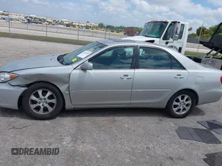 2005 Toyota Camry LE with VIN 4T1BF30KX5U088710, listed as a IAAI auction lot 42113518 with 182,277 mi miles and . Bid and sale history available at DreamBid. Image 14.
