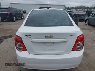 2014 Chevrolet Sonic LS z VIN 1G1JA5SH9E4180377, wystawiony jako IAAI lot #41839198 z przebiegiem 156 357 mil mil oraz . Historia ofert i sprzedaży dostępna na DreamBid. Obrazek 16.
